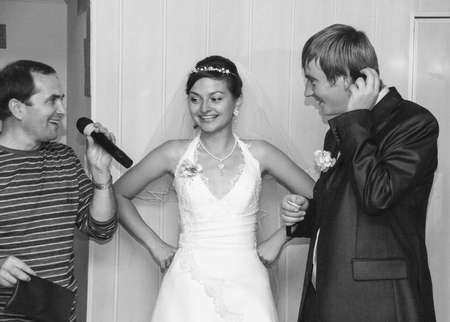 LUTSK, UKRAINE - 12 October 2008: Emotional reaction of the bride to the guest greetings during weddingのeditorial素材