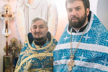 VOYUTYN, UKRAINE - 14 OCTOBER 2017: Orthodox priest during celebration Pokrov