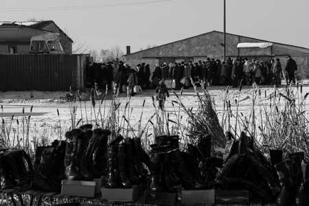 Zabolottia, Volyn / Ukraine - January 20 2009: Passengers stand in line next train at railway station near local marketのeditorial素材