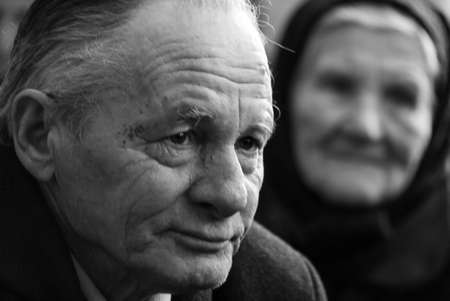 Kovel, Volyn / Ukraine - February 17 2009: Contemplative old caucasian man looking away. Shallow depth of field.のeditorial素材