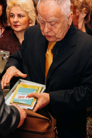 Zbarag, Ternopil / Ukraine - February 20 2009: Ukrainian poet, translator, scriptwriter, culturologist, political and public figure Dmytro Pavlychko at exhibitionのeditorial素材