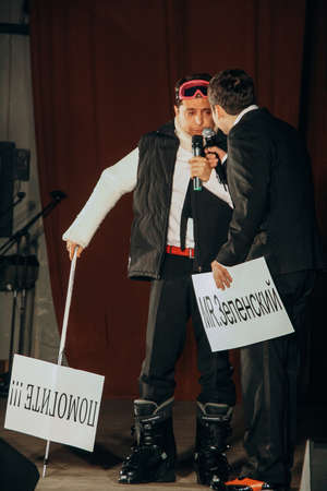 Lutsk, Volyn / Ukraine - November 24 2009: Ukrainian actor Vladimir Zelensky (L) in ski boots and...