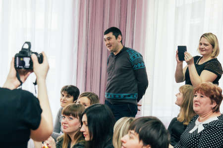 Lutsk, Volyn / Ukraine - March 02 2016: Parents during holiday in nursery school. Shallow depth of...