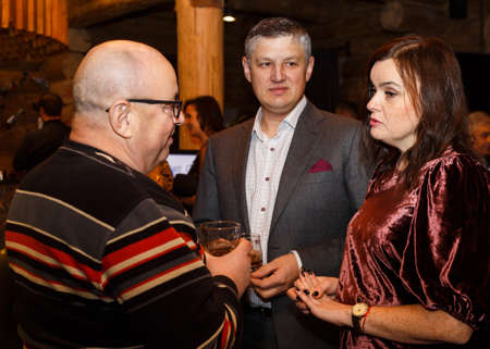 Lutsk, Volyn / Ukraine - November 17 2017: Men and woman drinking at restaurantのeditorial素材