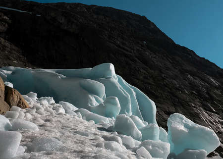 Scenic glacial landscape with mountains and Briksdalsbreen Glacier, Norway