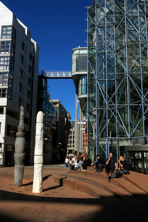 Oslo, Norway - May 02 2007: Abstract sculpture on a street with people aroundのeditorial素材