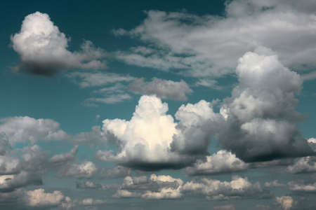 White clouds on the blue sky on sunny day