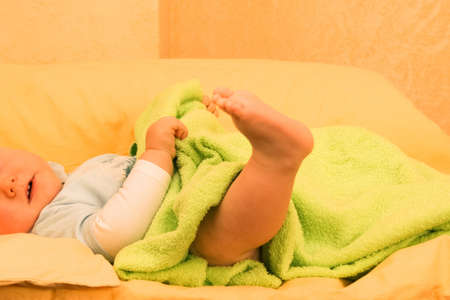 Close up view of cute baby arm. Shallow depth of field.の写真素材