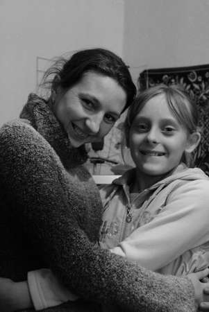 Volycia, Ukraine - March 25 2009: Woman and child posing together at homeのeditorial素材