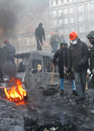 Kyiv, Ukraine - January 24 2014: Protasters with Molotov cocktails on Grushevskogo street during...