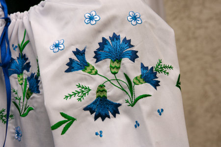 Fragment of female embroidered shirt on the mannequin. Shallow depth of field.