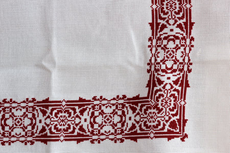 Tablecloth with embroidered flower and decorative ornament
