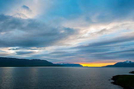 Midnight sunset landscape in Icelandの写真素材