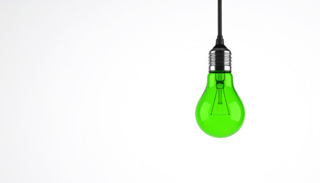 Green light bulbs on white background. Technology and ecology conceptの素材