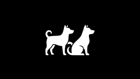 Minimalist white dogs silhouette logo on black backgroundの素材