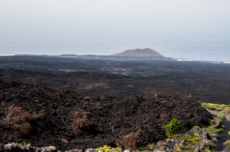 Solidified volcanic lava stream from the Cumbre Vieja volcano on the island of La Palmaの写真素材