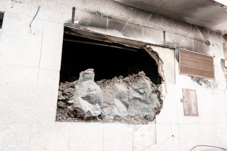 Building destroyed by the volcanic lava flow from the Cumbre Vieja volcano, on the island of La Palmaの写真素材