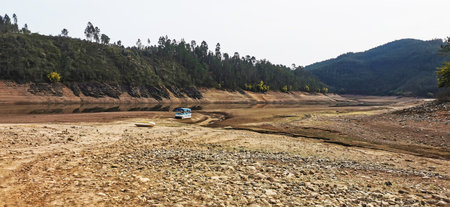 Dry river bed, with no waterの写真素材