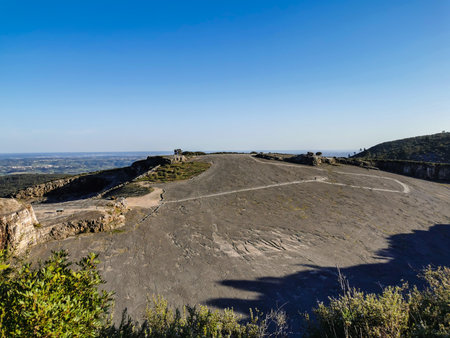 Natural monument of fossil dinosaur footprints in Serra D 'Aire in Pedreira do Galinha, in Portugal. A pedagogical circuit was created at the site, where visitors can see and touchの写真素材
