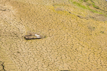 The Ponsul River is a affluent of the Tejo River, in Portugal, and is a very large river. At this time it is completely dry, without water and with its bed cracked. Climate changeの写真素材