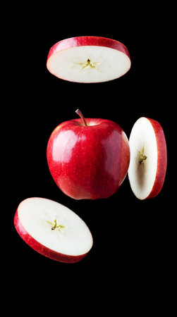 Fresh and delicious sliced apple isolated on backgroundの素材