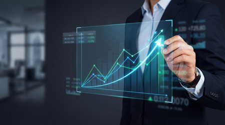 Businessman observing growth arrow on holographic chart showing upward trend. Concept of success in stock marketの素材