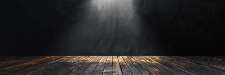 A desolate dark room with wooden floorboards, illuminated by an overhead spotlight in a dramatic atmosphere.の素材