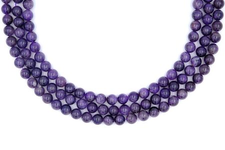 3 layer of purple amethyst natural stone necklace isolated on white backgroundの写真素材