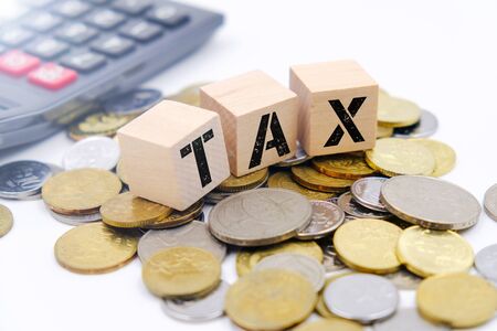 Tax conceptual image over coinの写真素材