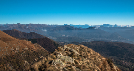 View from the summit of monte lema on the swiss and italian alpsの写真素材
