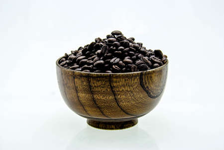 Coffee beans in a cup  on white backgroundの写真素材