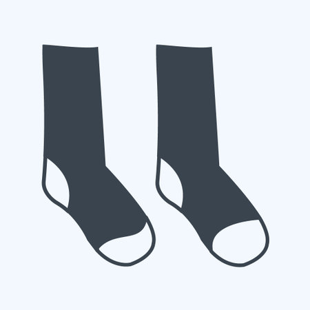 Socks Icon in trendy glyph style isolated on soft blue background