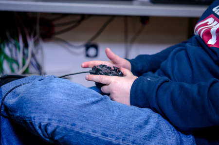 Photo of the Joystick in their handsの写真素材