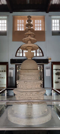 Historic Stone Stupa with Intricate Carvings Displayed in Museum Hall Taxila, Pakistan, September 11 2025のeditorial素材
