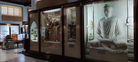 Taxila, Pakistan, September 11 2025 Ancient Buddhist artifacts displayed in Taxila Museum Pakistan showcasing Gandhara civilisation art and heritageのeditorial素材