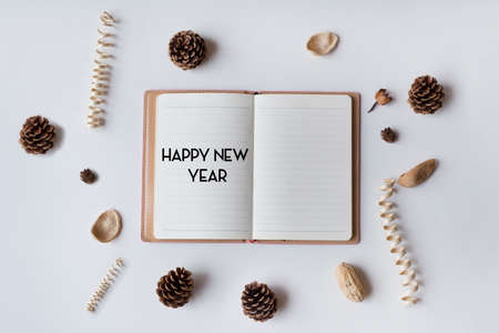 Conceptual,notebook on a with table. open diary with Happy New Year Words 2017の写真素材