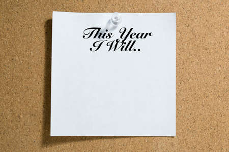 Conceptual,notebook on a white table. open diary and pen This Year I Will.. wordsの写真素材