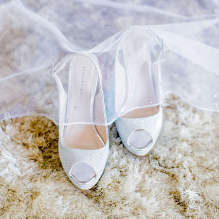 MELAKA, MALAYSIA - AUGUST 3, 2017 : Elegant wedding high heel shoe design by Fabiano Ricco. Fabiano Ricco is a fashion house specialising in shoes, handbags, accessories and fragrances.のeditorial素材