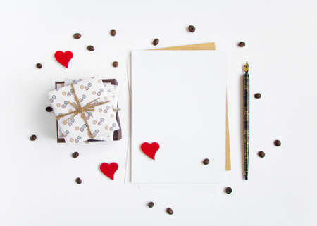 Handmade gifts and a letter on white background decorated with hearts and coffee beans. Rustic...