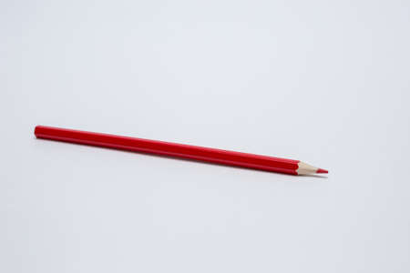 Red pencil on a white background.の写真素材