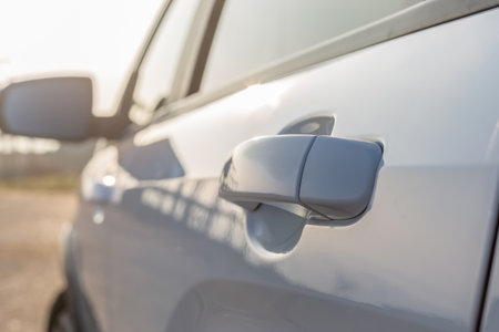 The door handle of a modern car. Close-up.