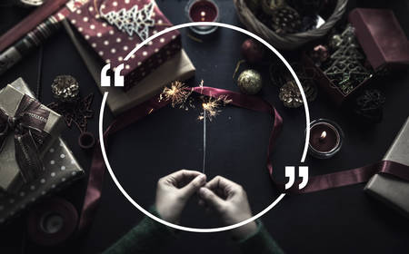 Overhead shot of Christmas presents and wrapping papersの写真素材