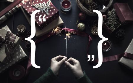 Overhead shot of Christmas presents and wrapping papersの写真素材