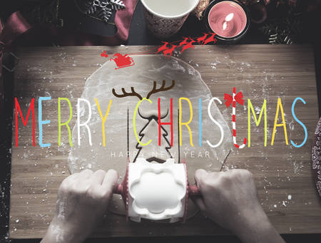 Overhead shot of Christmas presents and wrapping papersの写真素材