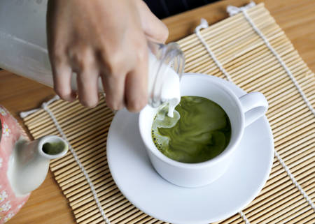 Matcha Tea on wood tableの写真素材