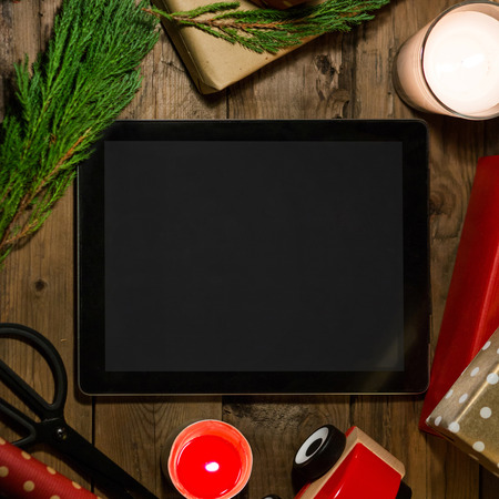 Tablet mock up with a copyspace for Christmas.Christmas applicationの写真素材