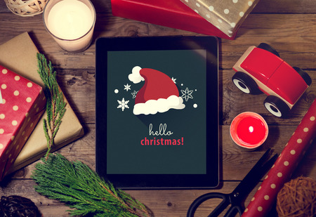 Tablet mock up  with a copyspace for Christmas.Christmas application with Graphic for Christmas.Christmas application