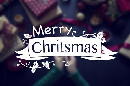 Overhead shot of Christmas presents and wrapping papersの写真素材