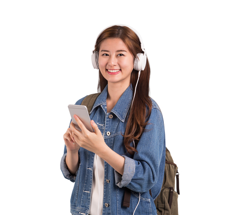 Asian woman use mobile for listening music.の写真素材