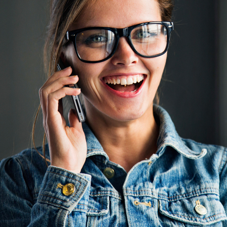 Business woman with a phoneの写真素材